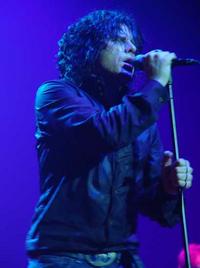 Ian Astbury singing in The Doors.